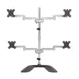 StarTech.com Desktop Quad Monitor Stand - Ergonomic VESA 4 Monitor Arm (2x2) up to 32" (17.6lb/8kg) - Free Standing Articulating Universal Pole Mount - Height Adjustable/Tilt/Swivel/Rotate - Silver