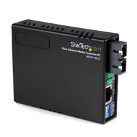 StarTech.com Multi-Mode (MM) SC Fiber Media Converter for 10/100Mbps Networks, Standalone Ethernet to SC MM Fiber Media Converter, 1310nm, 2km - TAA