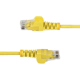 StarTech.com 9in Yellow Slim CAT6 Ethernet Cable, Snagless, 100W PoE, UTP, LSZH, 28AWG Pure Bare Copper Wire, Slim RJ45 Network Patch Cord w/Strain Reliefs, Individually Tested