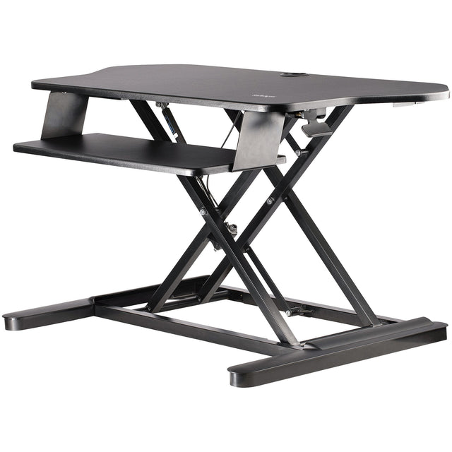 StarTech.com Corner Sit Stand Desk Converter with Keyboard Tray - Large Surface (35" x 21") - Height Adjustable Ergonomic Desktop/Tabletop Standing Workstation - Supports Dual Monitors - TAA
